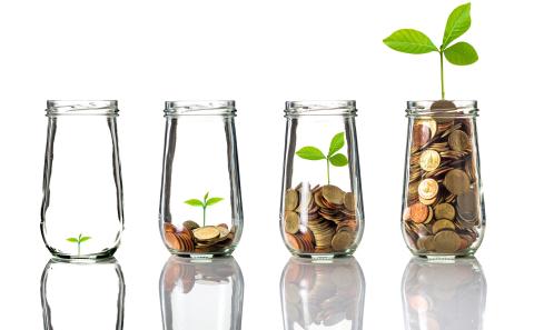 Visual depiction of ROI, with stacked coins in jars increasing progressively to illustrate financial growth from training programs