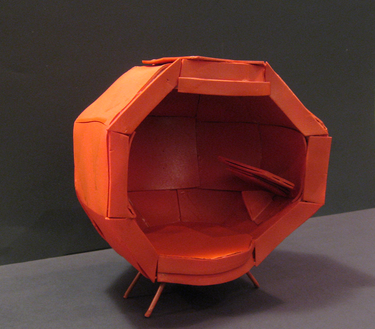 a mockup of a soft red chair