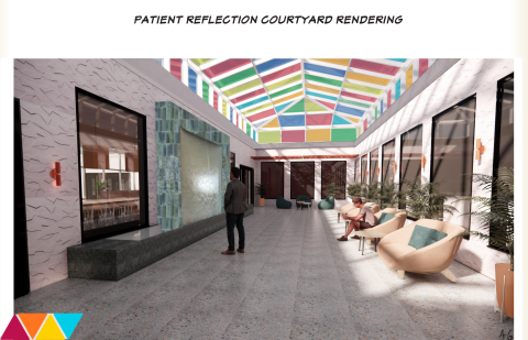 Patient Reflection Courtyard - Shows multicolored glass ceiling, water feature, and comfortable seating.